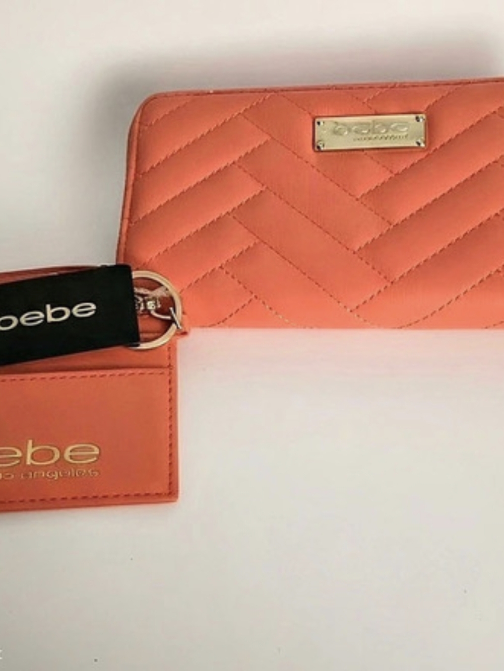 bebe Quilted Wristlet Wallet in Orange Like New